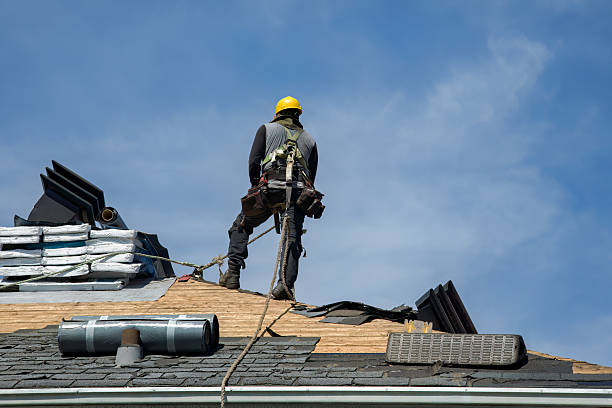 Professional Storm Damage Roof Repair technician working in Otterbein, IN